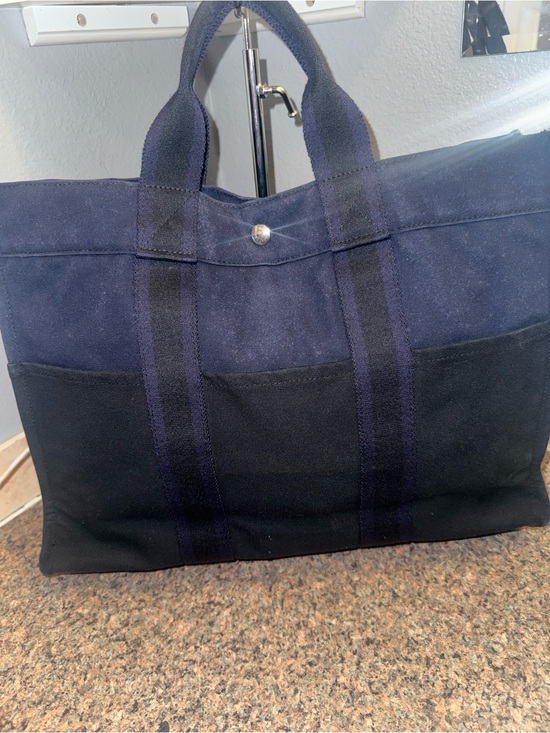 Hermes Handbags - Hermes 💎 LARGE Two-Tone Navy and Black tote amazing condition